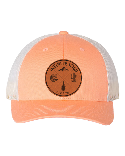 Infinite Wild Logo Trucker Hat Coral